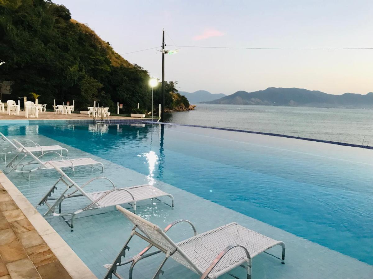 Apartamento Pe Na Areia Frente Para O Mar E Piscina Na Prainha カラグァタトゥバ エクステリア 写真